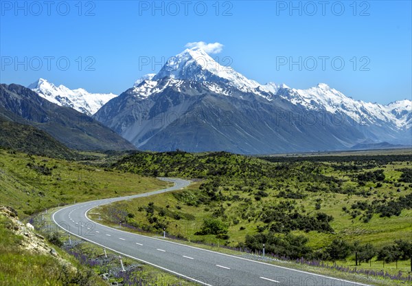 Country road overlooking snow-capped Mount Cook National Park