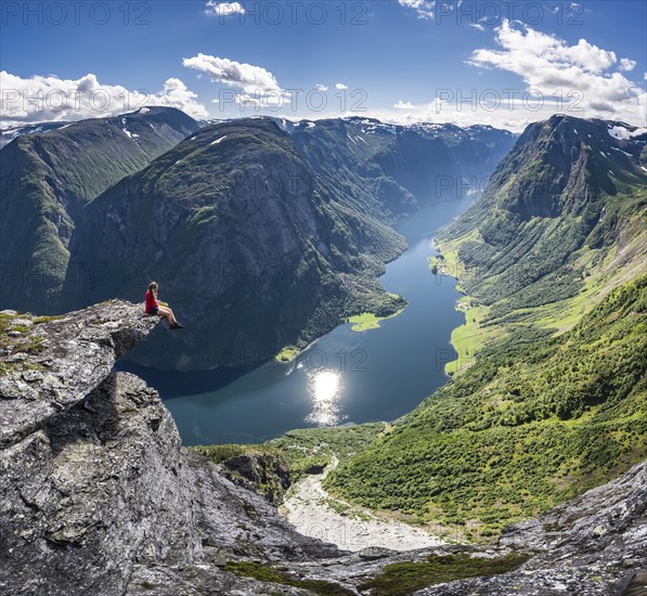 Hiker sitting on rock