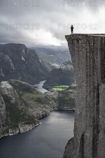 Single person on rock plateau