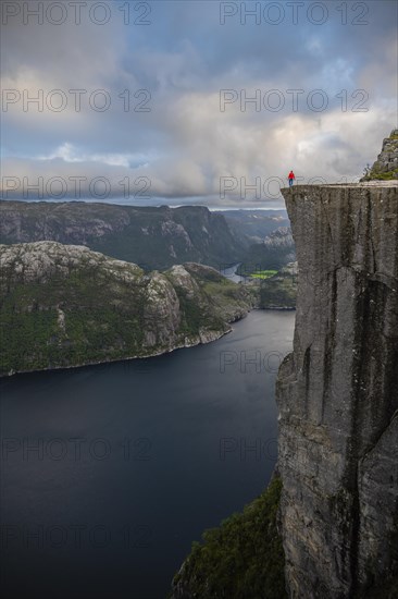 Single person on rock plateau