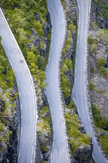 Cyclist on the mountain road Trollstigen