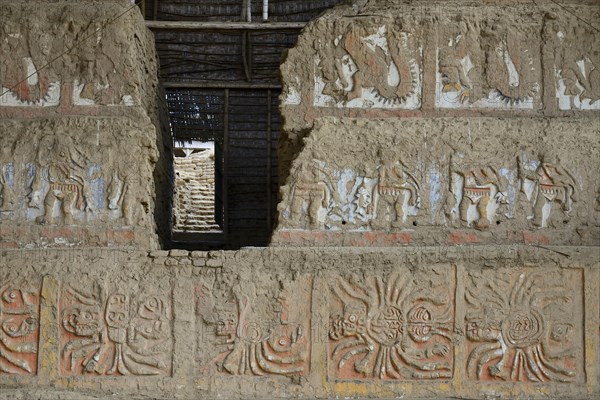 Colourful reliefs of the Moche culture on adobe walls