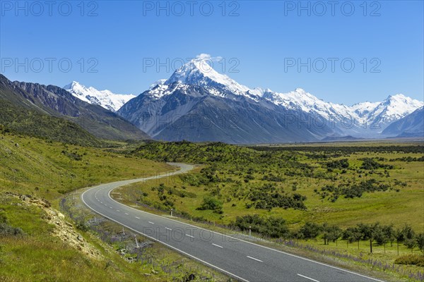 Country road overlooking snow-capped Mount Cook National Park