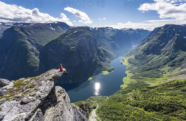 Hiker sitting on rock