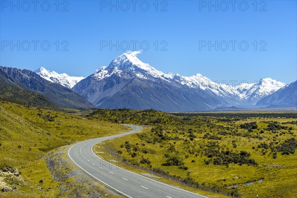 Country road overlooking snow-capped Mount Cook National Park