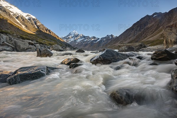 Hooker River in Hooker Valley with view of snow-capped Mount Cook