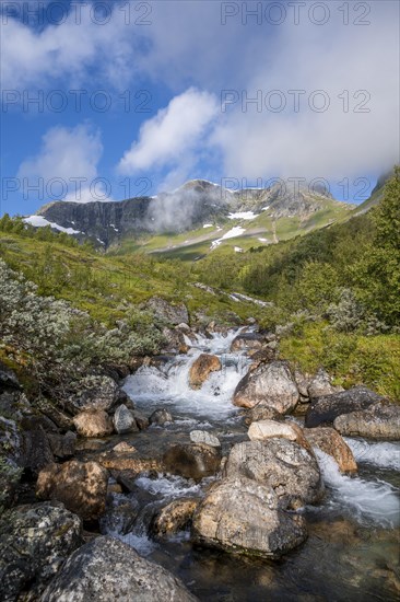 Mountain stream with mountains at Rimstigen