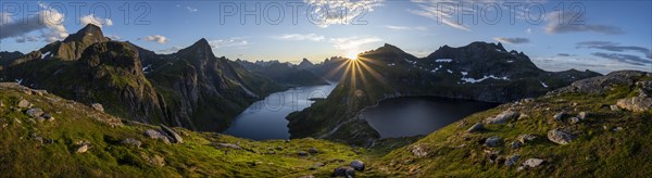 Sun shines over mountain landscape with fjord Forsfjorden and lake Krokvatnet