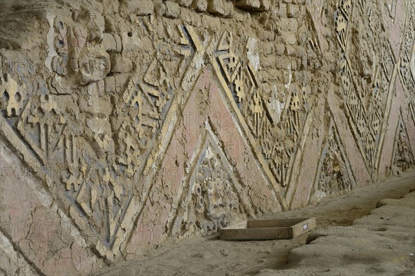 Colourful reliefs of the Moche culture on adobe walls