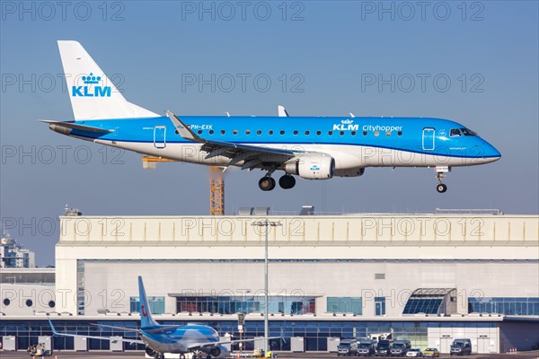 A KLM cityhopper Embraer ERJ175 with registration PH-EXK at Stuttgart Airport