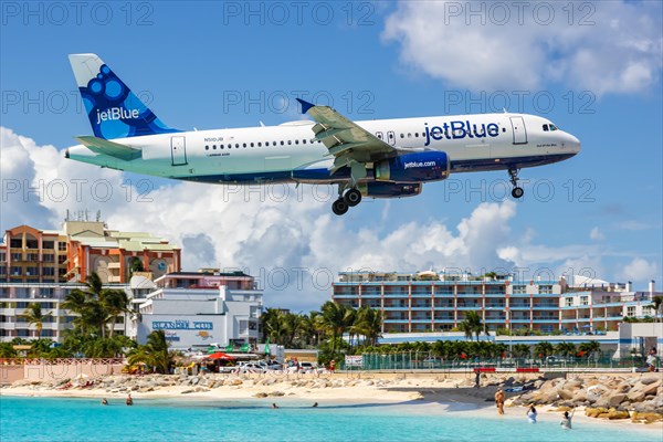 A JetBlue Airways Airbus A320 with registration N510JB lands at St. Maarten airport