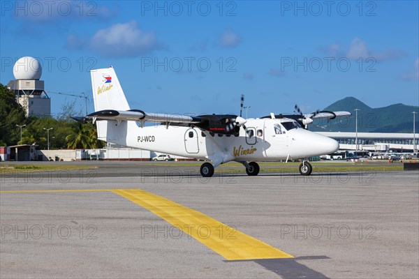 A DHC-6-300 Twin Otter of Winair with the registration PJ-WCD at the airport St. Maarten