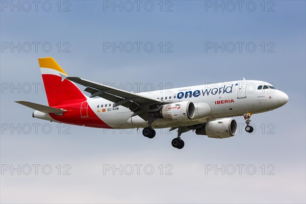 An Iberia Airbus A319 with registration number EC-KHM lands at London Heathrow Airport