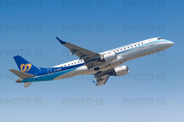 A Mandarin Airlines Embraer 190 aircraft with registration number B-16829 at Hong Kong Airport