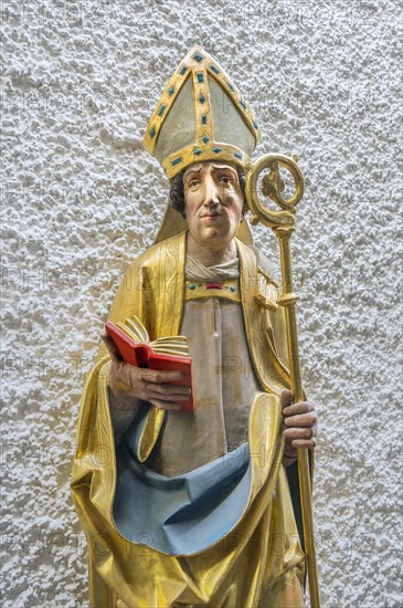 Figure of a saint with crosier and book