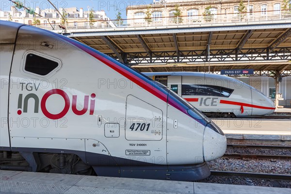 French TGV and German ICE high speed train Deutsche Bahn DB train HGV Paris Est Station