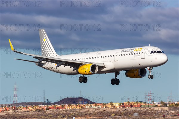 A Vueling Airbus A321 aircraft with registration EC-MMH at Tenerife South Airport