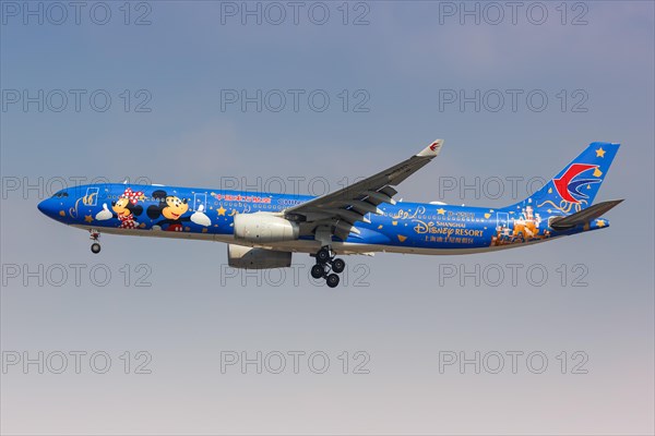 A China Eastern Airlines Airbus A330-300 with registration number B-6507 and special Disney Resort livery at Shanghai Hongqiao Airport