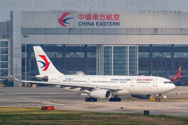 An Airbus A330-200 aircraft of China Eastern Airlines with registration number B-6537 at Shanghai airport