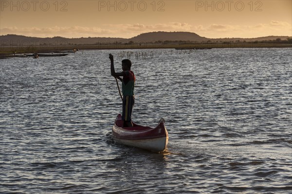 Fisherman with pirogue at the Manambolo