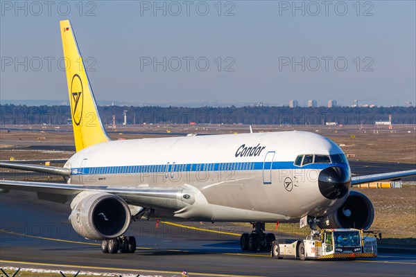 A Boeing 767-300ER aircraft of Condor with registration D-ABUM in the retro special livery at Frankfurt Airport