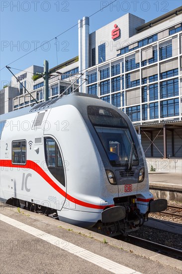 IC2 Intercity 2 train double decker locomotive in Stuttgart main station in Germany portrait format