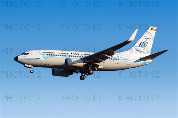 A Boeing 737-700 of Tarom with the registration YR-BGG and the retro special livery at Athens Airport