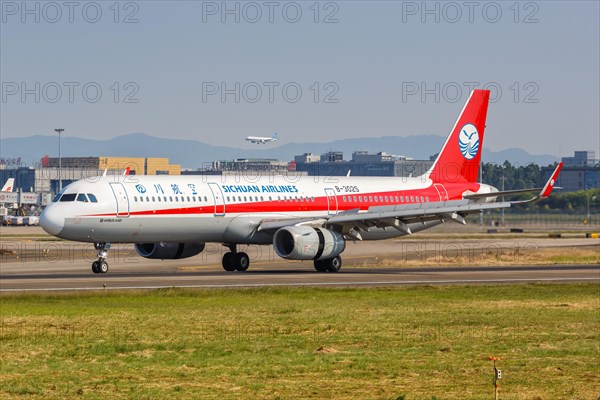 An Airbus A321 aircraft of Sichuan Airlines with registration number B-302S at Guangzhou airport