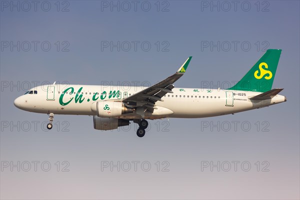 A Spring Airlines Airbus A320 with registration number B-1025 at Shanghai Hongqiao Airport