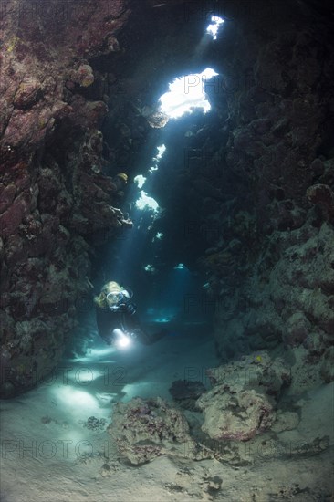 Diver in underwater cave