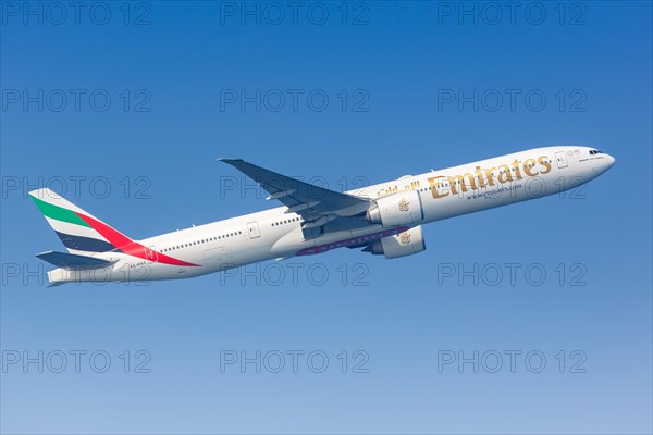 An Emirates Boeing 777-300ER with the registration A6-EGT at Male Airport