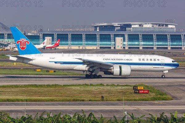 A China Southern Cargo Boeing 777F aircraft with registration number B-2027 at Guangzhou Airport