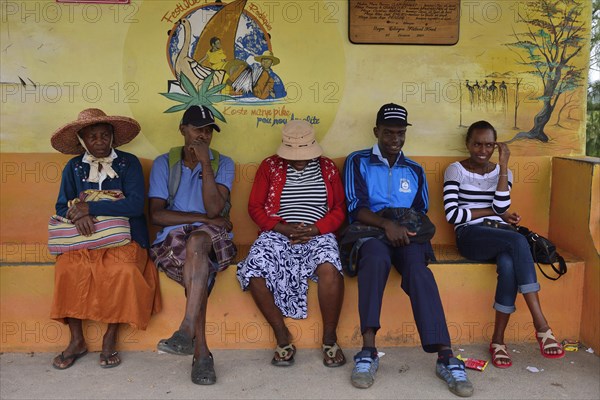 Locals waiting at the bus stop