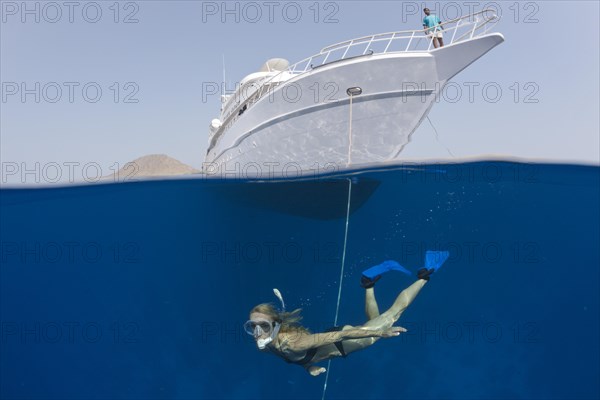 Snorkeling in front of safari ship