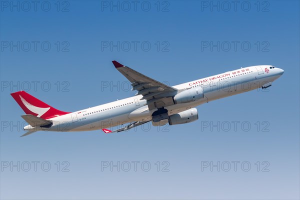 A Cathay Dragon Airbus A330-300 aircraft with registration B-HLM at Hong Kong Airport