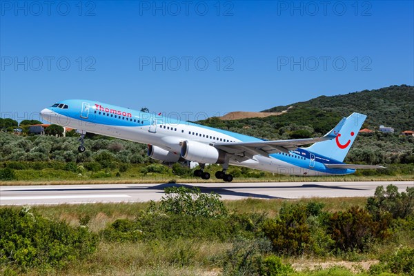 A Boeing 757-200 of Thomson Airways with the registration G-OOBB at Skiathos Airport