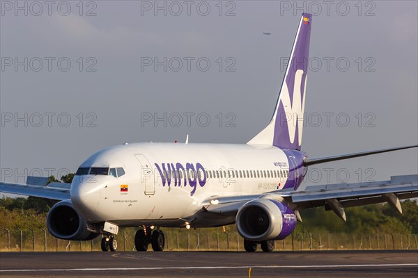 A Wingo Boeing 737-700 aircraft with registration C-GTQG at Cartagena Airport