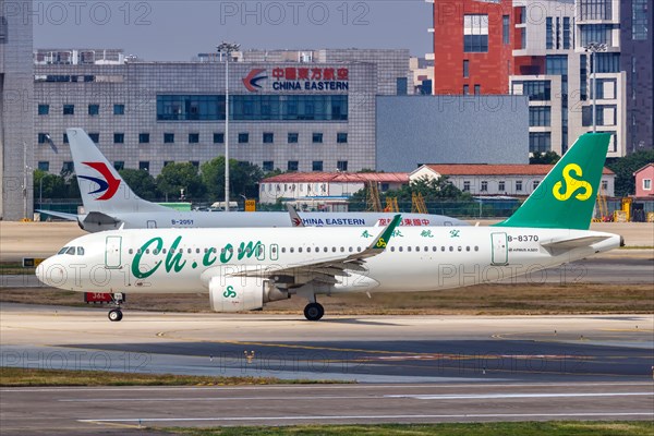 A Spring Airlines Airbus A320 with registration number B-8370 at Shanghai Hongqiao Airport