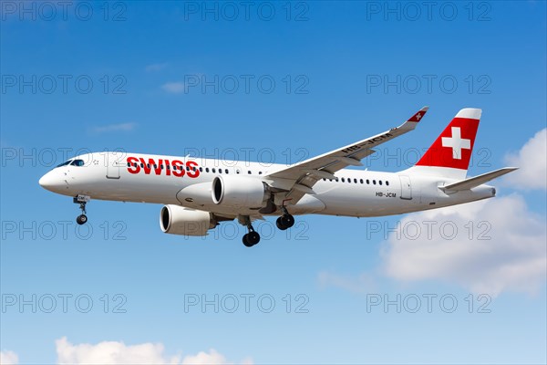 A Swiss Airbus A220-300 with the registration HB-JCM lands at London Heathrow Airport