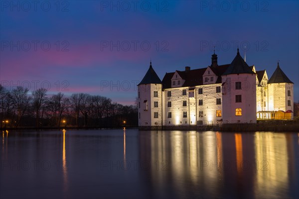 Gluecksburg moated castle at blue hour