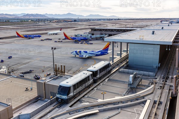 Boeing 737 aircraft of Southwest Airlines and PHX Sky Train at Phoenix Airport