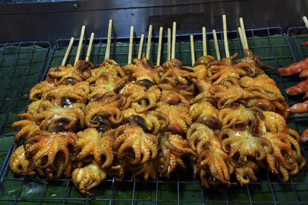 Grilled squid skewers