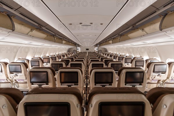 Economy class cabin of an Airbus A340-300 aircraft of Swiss at Zurich airport