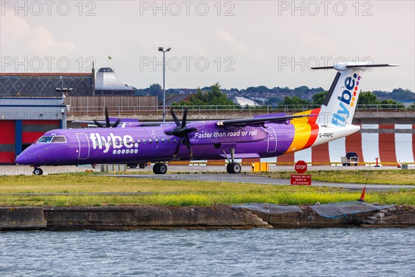 A Flybe Bombardier DHC-8-400 with registration G-PRPC at London City Airport