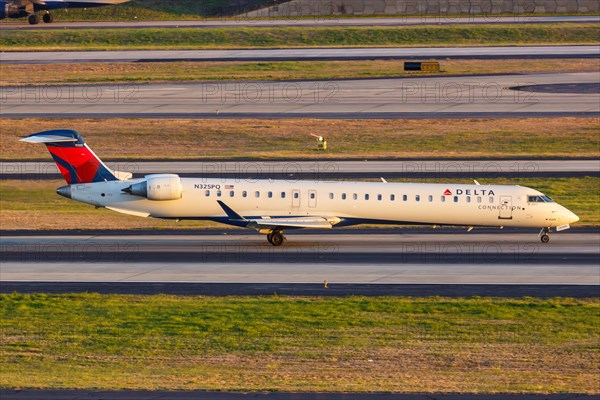 A Bombardier CRJ-900 aircraft of Delta Connection Endeavor Air with registration N325PQ at Atlanta Airport