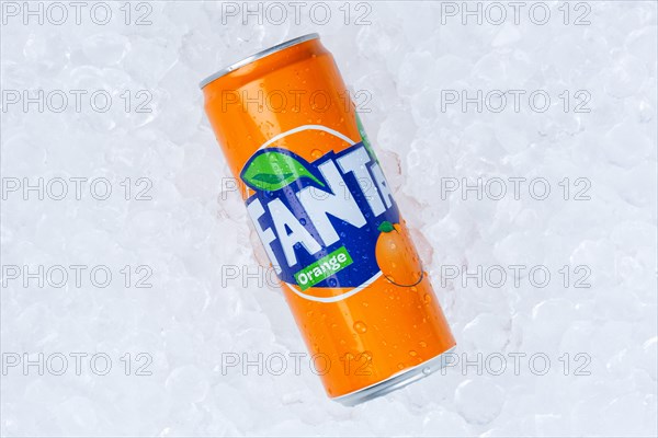 Fanta Orange lemonade soft drink beverage in beverage can ice cube ice cubes