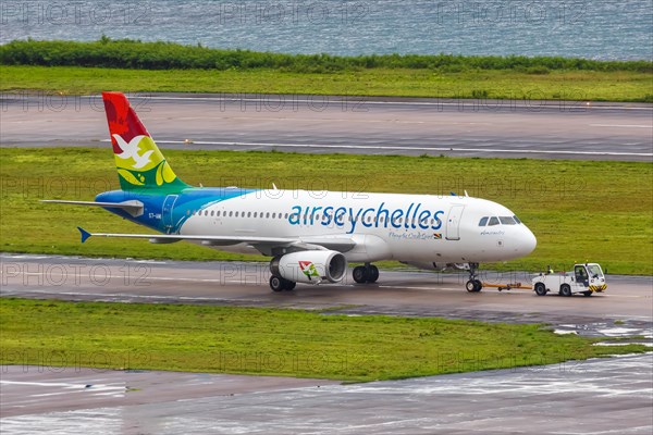 An Air Seychelles Airbus A320 aircraft with registration number S7-AMI at Mahe Airport