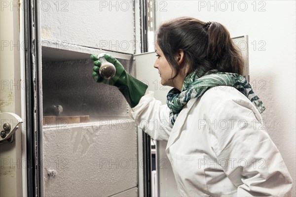 Laboratory technician examines samples in the laboratory icebox at -80 degrees at the Institute for Pharmaceutical Biology and Biotechnology at Heinrich Heine University Duesseldorf