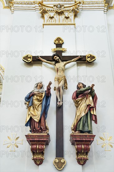 Christ on the cross with mourning figures