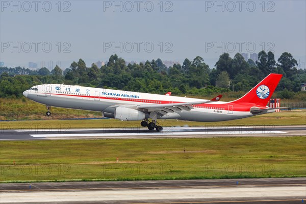 An Airbus A330-300 aircraft of Sichuan Airlines with registration number B-8690 at Chengdu Airport